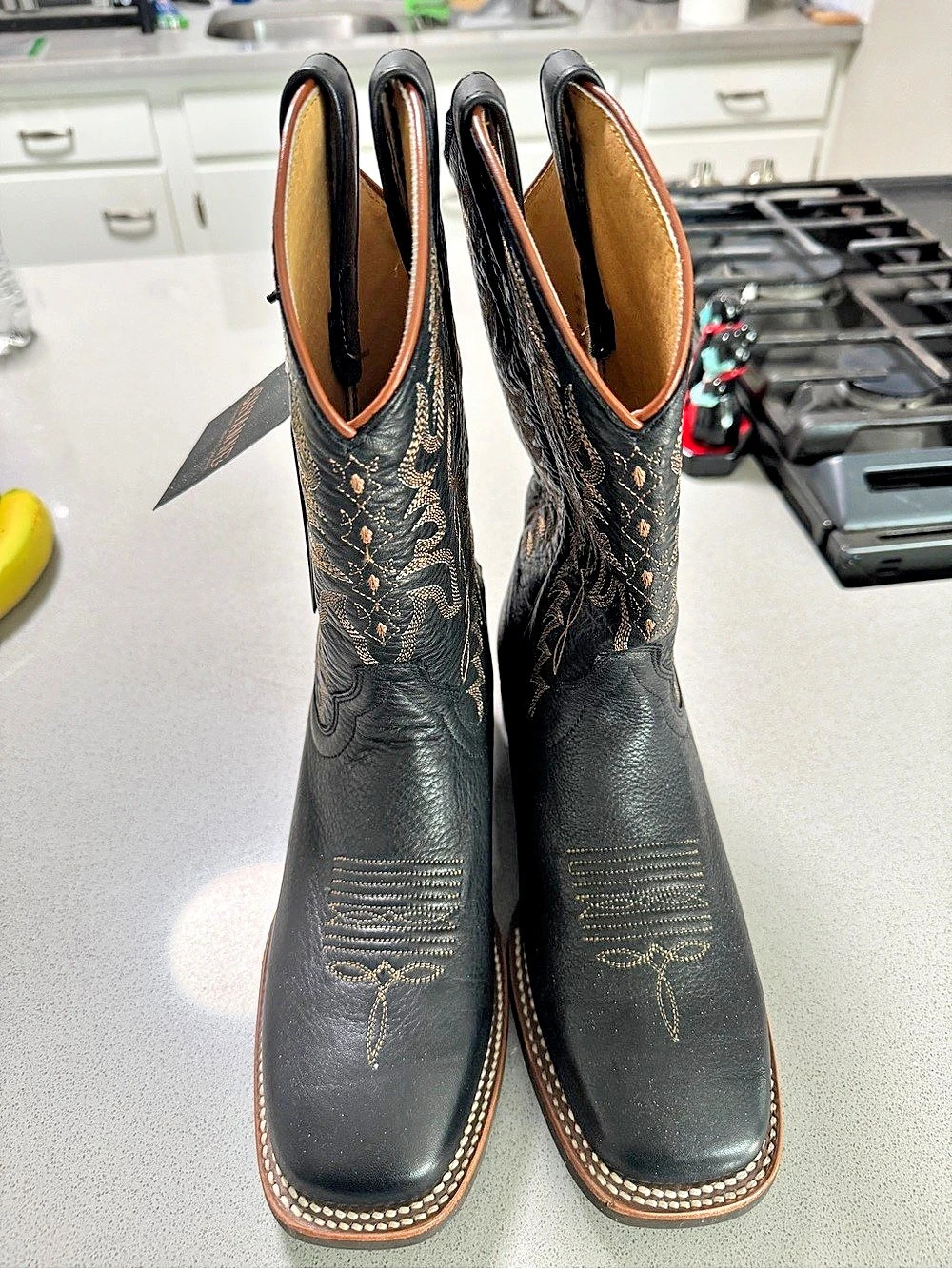 ShyannĂŠ Paisley Heeled Boots in Black & Brown